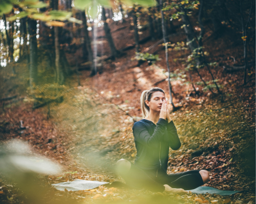 Woman Meditating in Nature for Inner Peace